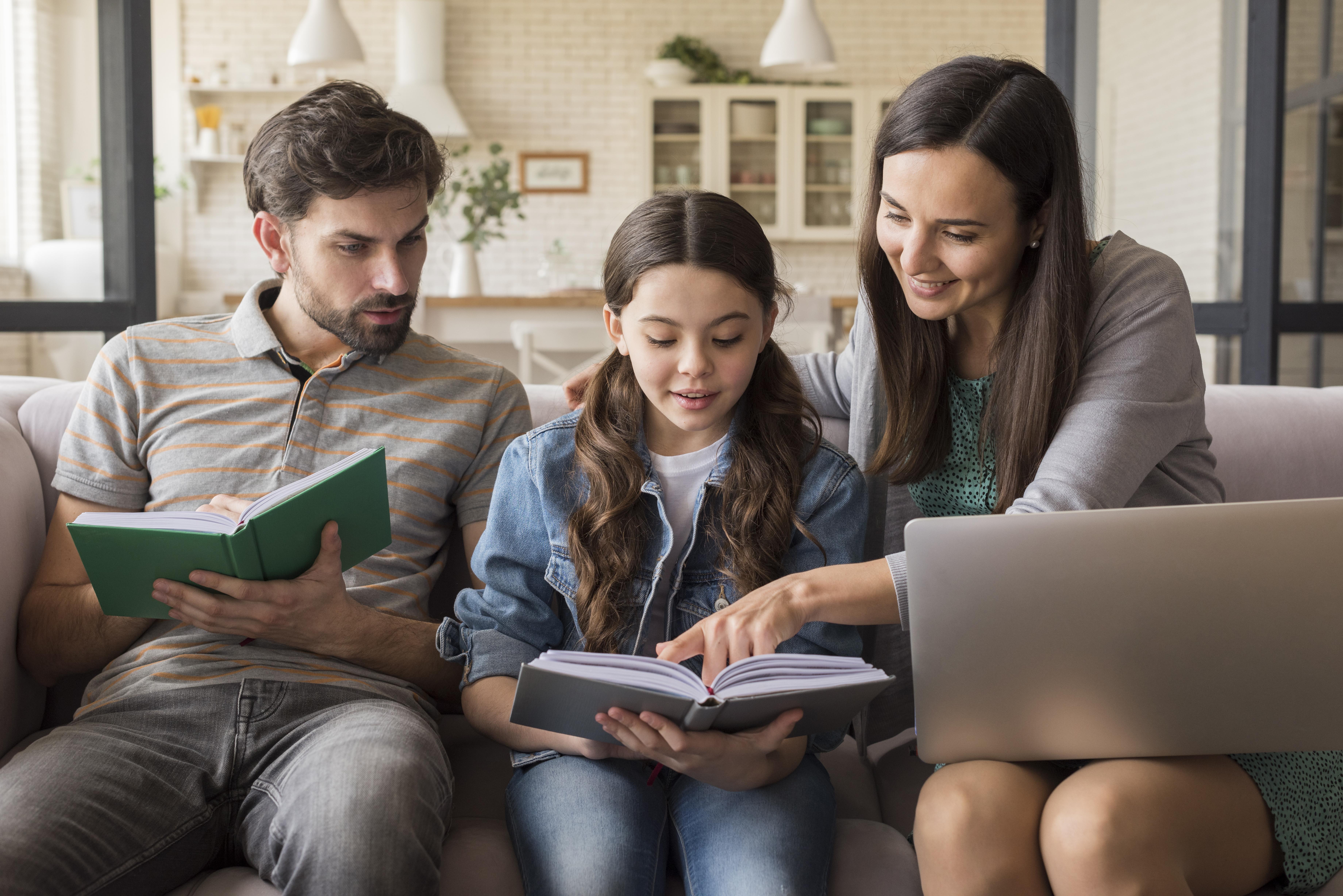 parents-teaching-girl-to-read.jpg
